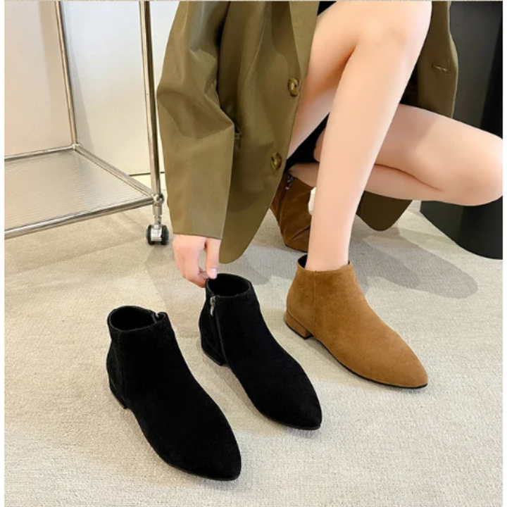 Damenstiefeletten mit flachem Absatz und minimalistischem Design - Damenstiefeletten