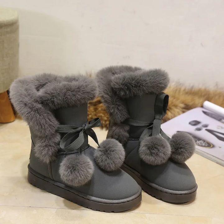 Elegante Winterstiefel mit Pompom-Verzierung