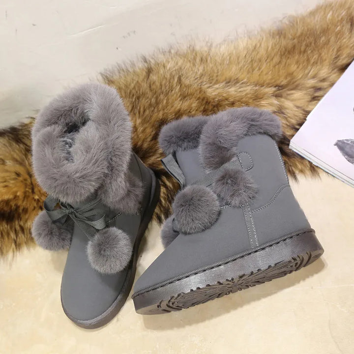 Elegante Winterstiefel mit Pompom-Verzierung